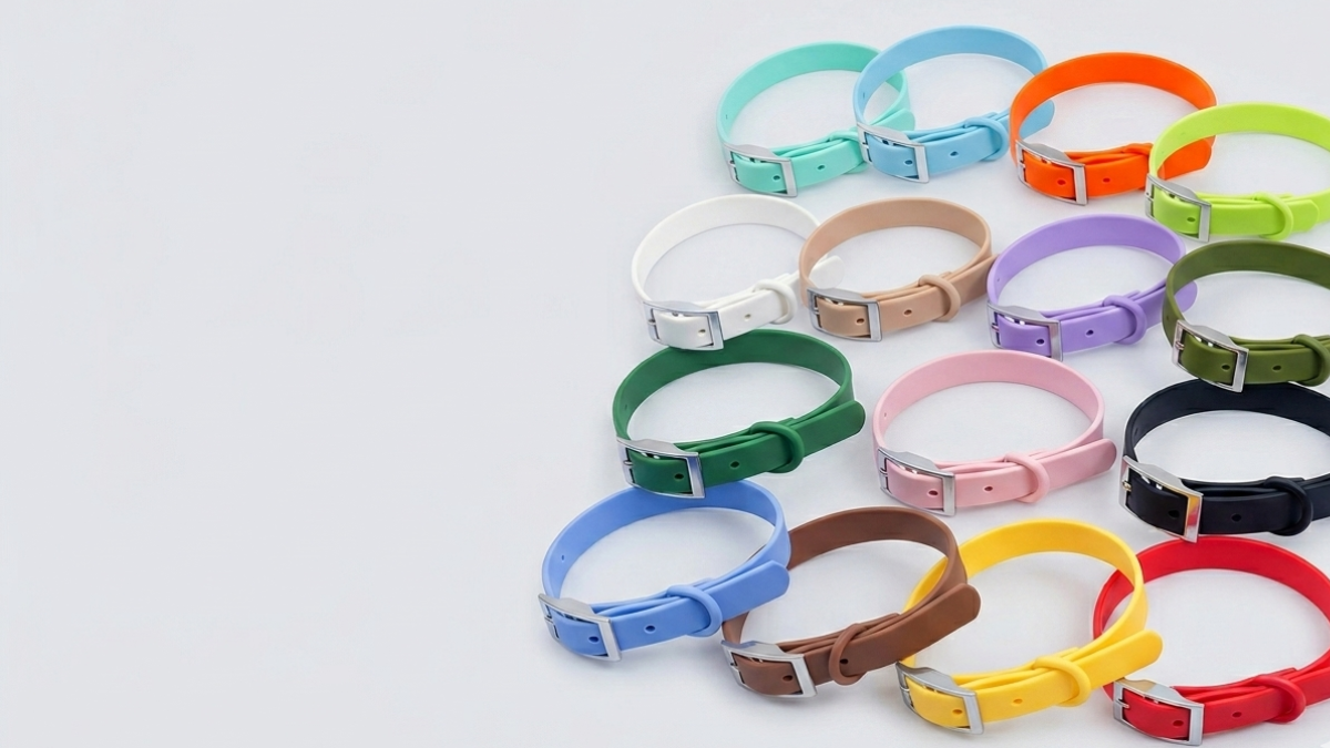 MoonianPet waterproof dog collars in multiple colours arranged in a flat lay — full colour range of PVC coated adjustable dog collars