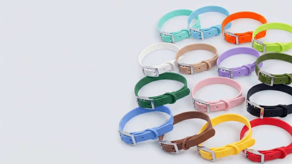 MoonianPet waterproof dog collars in multiple colours arranged in a flat lay — full colour range of PVC coated adjustable dog collars